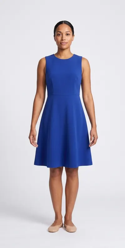 AI try-on example: the same woman in a cobalt crepe a-line dress